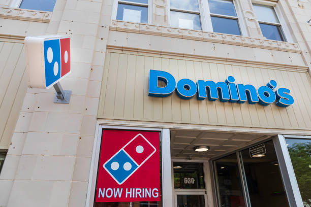 Façade of Domino's, sign, logo, "now hiring"-Winston Salem stock photo