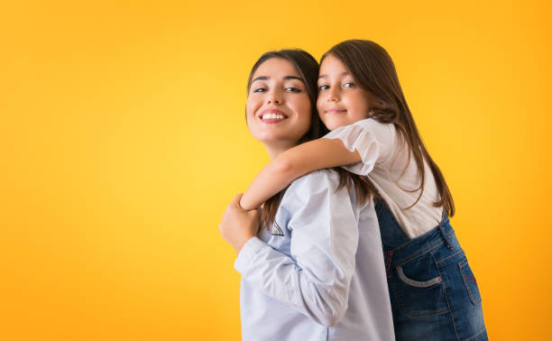 istock Mother posing with her happy kid 1321558246