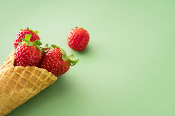 istock Strawberry in Ice Cream Cones 1321558457