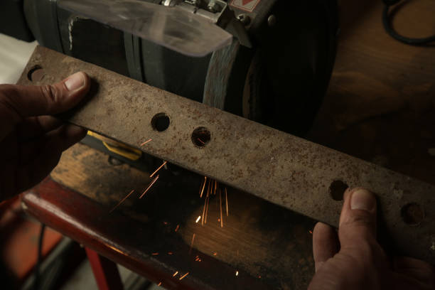 istock Man working with a piece of iron in mini table clamp 1321563661