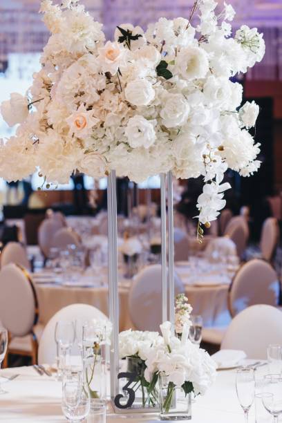 istock tableware Glasses, flower fork, knife served for dinner in restaurant with cozy interior 1321563675