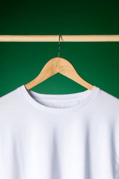T-shirt mockup on wooden hanger