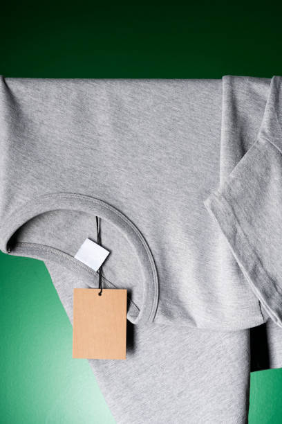 istock T-shirt mockup hanging over clothes rack 1321564054