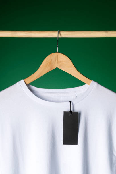 istock T-shirt mockup on wooden hanger 1321564420