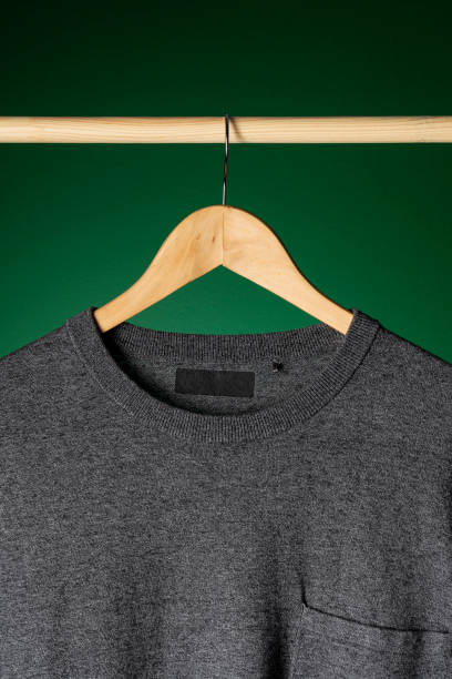 istock T-shirt mockup on wooden hanger 1321565995