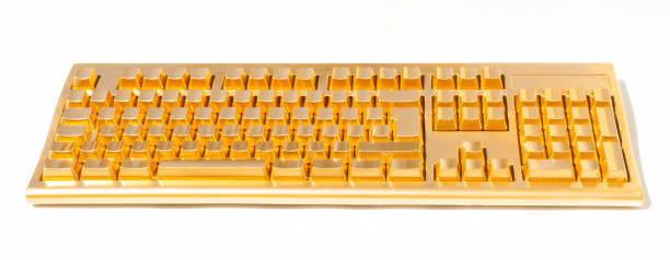 istock Golden keyboard on a sunny day. 1321568512