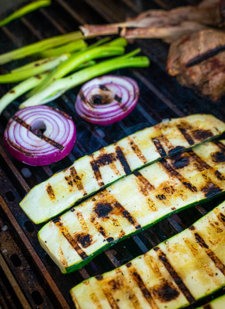 istock Zucchini and onions on the grill 1321579616