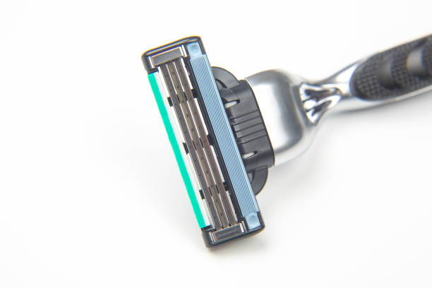 istock razor cassette on white background. manual face shaving machine. stubble blade. depilation 1321592115