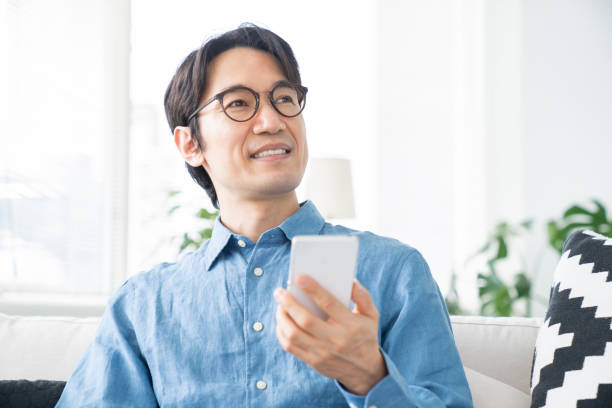 istock middle age man who uses smart phone 1321594690