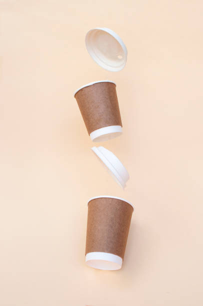 istock Bidegradable paper brown coffee cups with biodegradable white lids. 1321597812