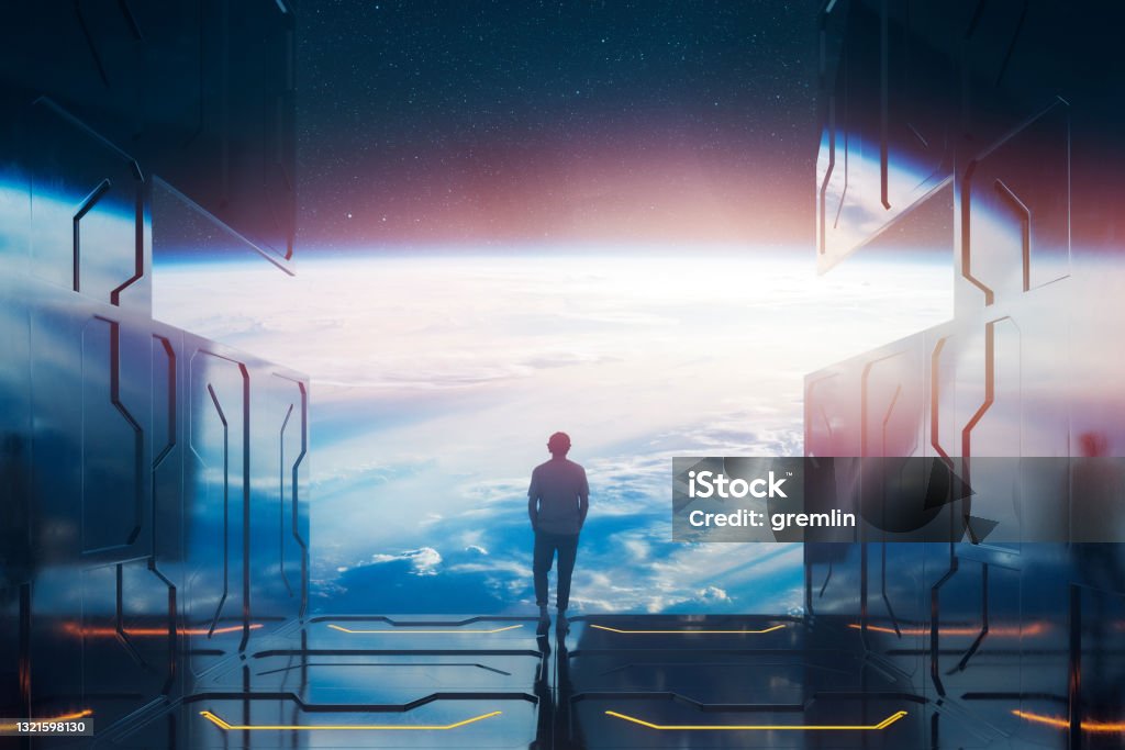 Casual man standing on space platform watching planet Earth Casual man standing on space platform watching planet Earth. 3D generated image. Earth texture is from Nasa (https://www.nasa.gov/image-feature/sunrise-shadows-over-the-philippine-sea). Time Machine Stock Photo