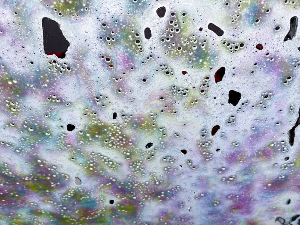 istock Abstract texture background view of a windshield in a car wash 1321604457