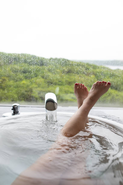 istock Luxury bath with feet up POV 1321606327