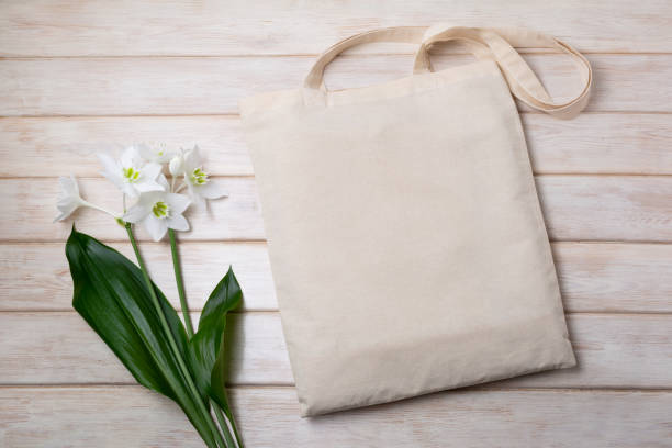 istock Rustic tote bag mockup with white lily 1321612630
