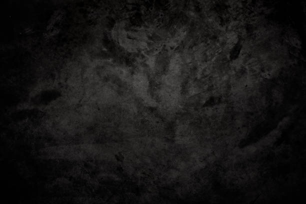 istock Black polished concrete wall texture background. Rough concrete grunge surface. 1321621026