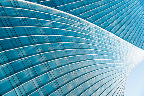 close up view of  unknown modern building exterior and glass windows.