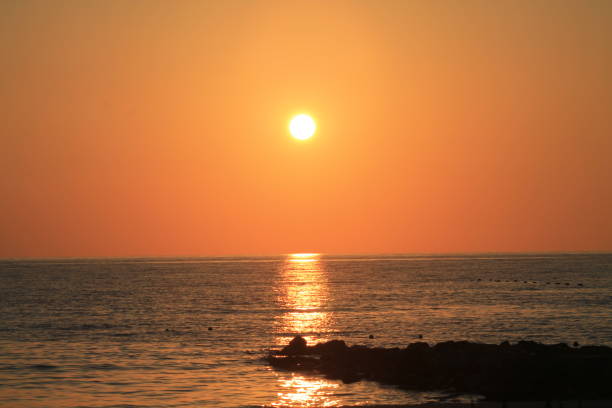 istock Beautiful Yellow Sunset over The Sea 1321648774