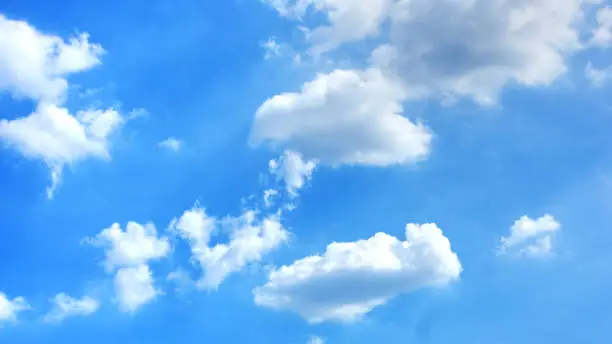 Beutiful clounds on blue sky background.