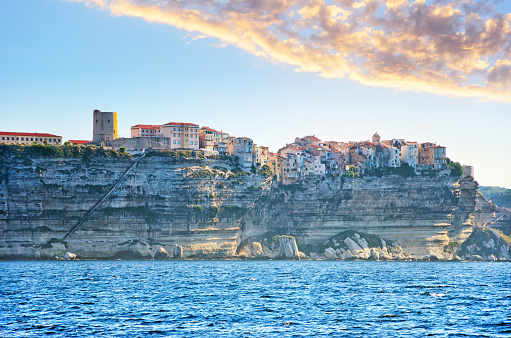 Houses of Bonifacio atop steep cliffs above the Mediterranean sea, Corsica, France