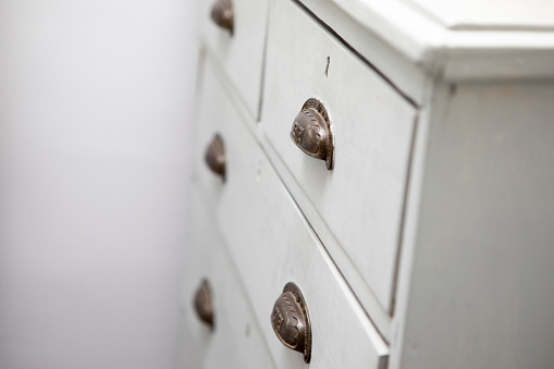An antique campaign chest isolated on a white background
