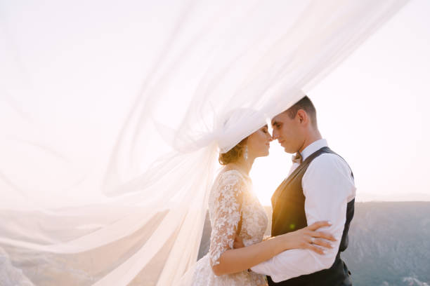istock Affectionate Couple Standing Outdoors 1321658535