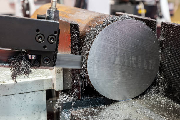 istock processing of a part on a band saw machine. designed for cutting almost all base metals 1321659656