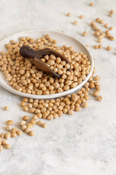 istock Plate of raw dry chickpea 1321660838