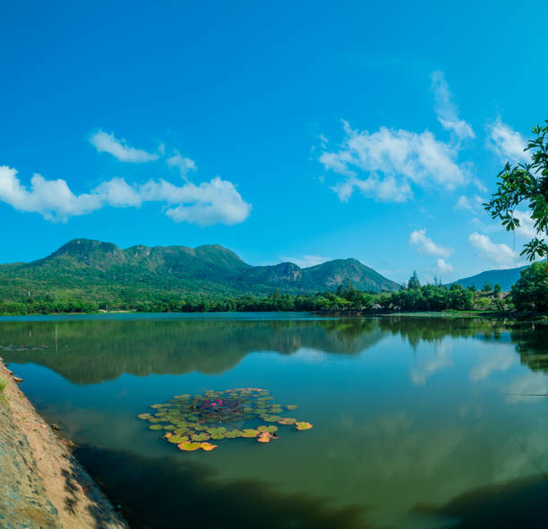 Clear view with An Hai Lake and mountain at Con Dao. Natural color Crystal Blue lake.