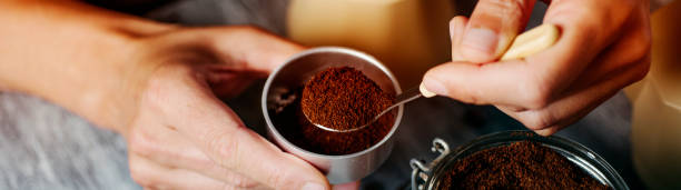 istock man prepares coffee in a moka pot, web banner 1321664275