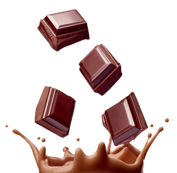 istock chocolate milk drink splash glass straw 1321664652