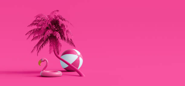istock Pink flamingo and palm tree on pink summer background 1321665861