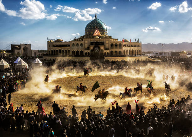 Taziyeh Performance, Shah Karam Shrine, Isfahan. Ashura is a holy day for Muslims all over the world, celebrated on the 10th day of Muharram, according to the Islamic calendar. Every year, on the occasion of Arbaeen Hosseini, the Tazi’eh of the Day of Ashura holds at Imam Zadeh Shah Karam, the descendants of Imam Reza (AS), in the historic village of Arisman, which is located in the city of Natanz, Isfahan province. day of ashura stock pictures, royalty-free photos & images