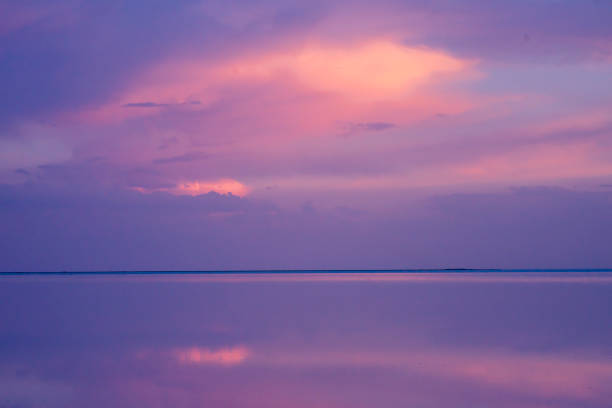 istock Reflection of clouds in the lake at sunset 1321682667