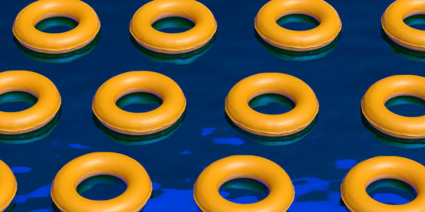 istock Vector illustration of seamless designed several inflatable yellow rubber rings in a pool with copy space 1321682884