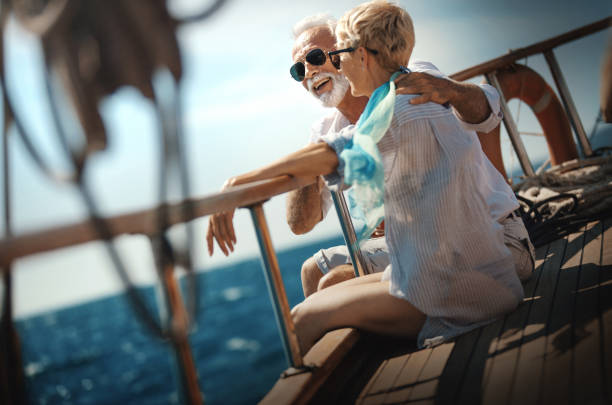 istock Senior couple on a sailing cruise 1321689537
