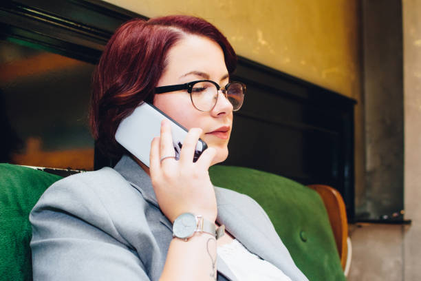 istock Woman using a phone stock photo 1321691102