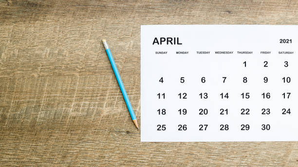 istock Close up the calendar on the brown table in planning ideas. 1321692978