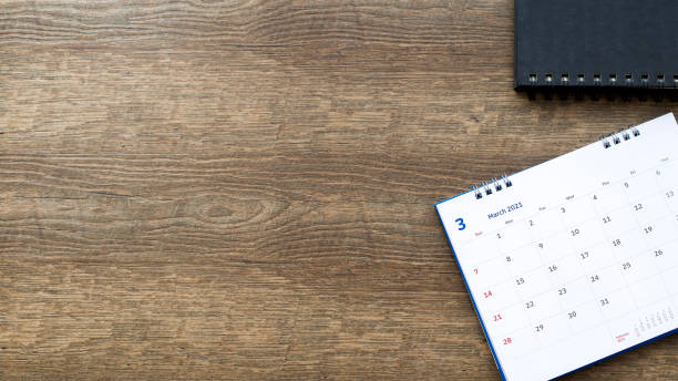 istock Close up the calendar on the brown table in planning ideas. 1321693106