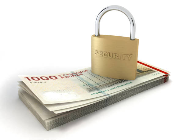 istock Danish krone falling money finance safe protection lock 1321697723