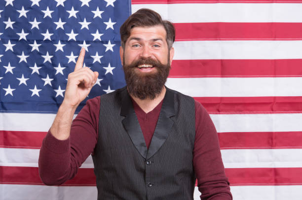 istock have great idea. Students exchange program. American patriotic people. USA Independence Day 4th of July. happy man at national flag. victory and freedom. education in america. American style 1321703188