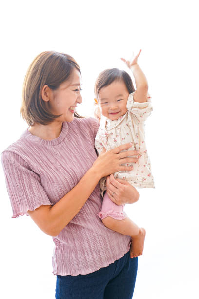 istock Mother holding a baby in her arms 1321703281