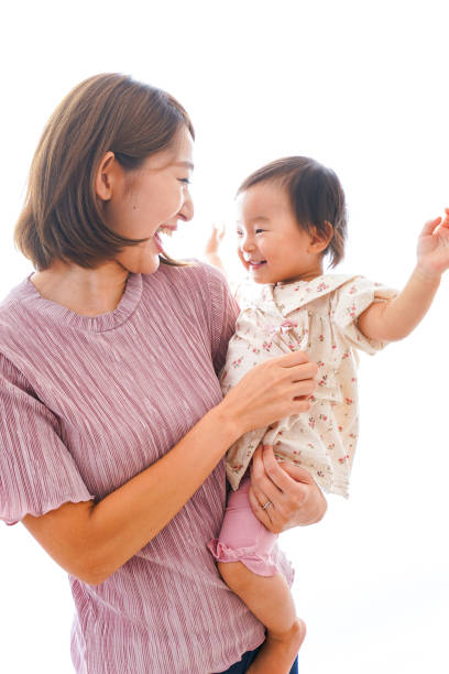 istock Mother holding a baby in her arms 1321703309