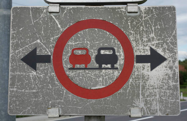 istock overtaking prohibited or no passing traffic sign 1321704067