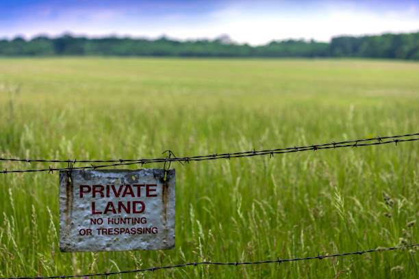 entrance to  fields of lush green grass in summer during lockdown