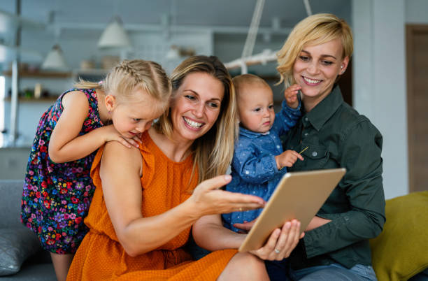 istock Young modern cheerful family talking through video-chat 1321708023