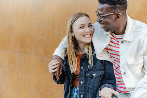 istock Interracial couple walking and having fun 1321710292