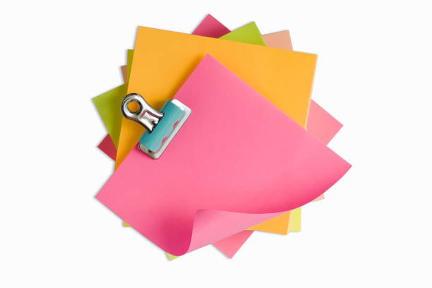istock Top view of colorful sticky note papers isolated on white 1321715207