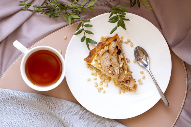 istock Beautiful breakfast with cottage cheese, pear pie and tea 1321715461