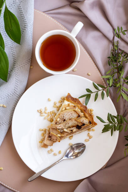 istock Beautiful breakfast with cottage cheese, pear pie and tea 1321715490
