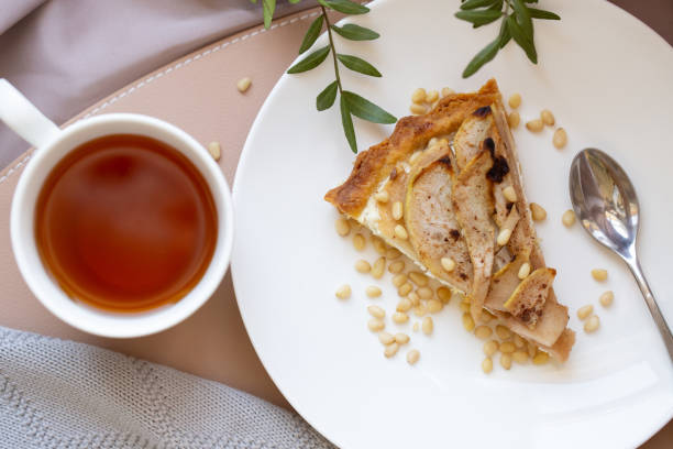 istock Beautiful breakfast with cottage cheese, pear pie and tea 1321715538